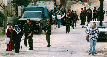 Photo: Old women telling off soldiers