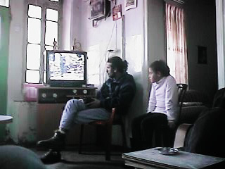 Photo: In George's house, watching the TV