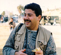 Photo: University photographer Yasser Darweesh, eating an onion