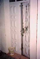 Photo: Smashed door.