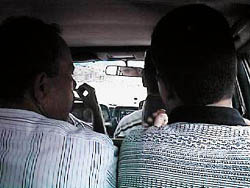 Photo: Stressed taxi occupants