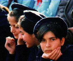 Photo: Girl scout looks into the lens