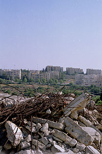Photo: Demolished Palestinian home in front of Kiryat Arba