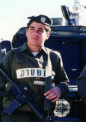 Photo of jeep with its flashing blue light protected by a cage