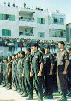 Photo: Standing at attention while the flag is raised.