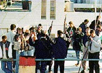 Photo: Journalists and Palestinian police on the roof of the newly deserted Police Station