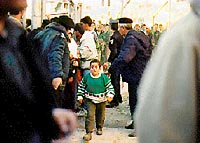 Photo: Kid walking into the police station for a look