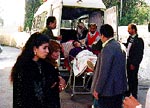 Photo: Woman crushed in crowd at Arafat speech in Ramallah arrives at the hospital