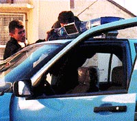 Photo: Palestinian police add police lights to a newly donated vehicle