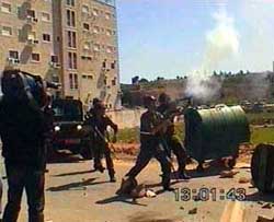 Photo: Israeli soldiers open fire with teargas.