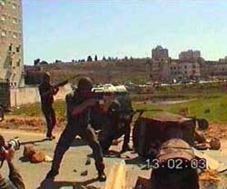 Photo: Israeli soldiers open fire with rubber-coated metal bullets.