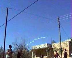 Photo: Teargas thrown back by Palestinian students ends up in another nearby garden.